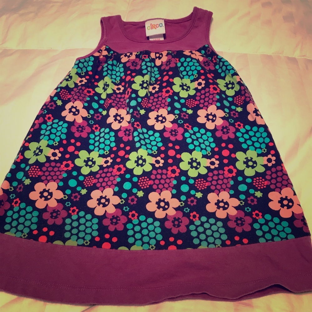 Purple dress with flowers on it